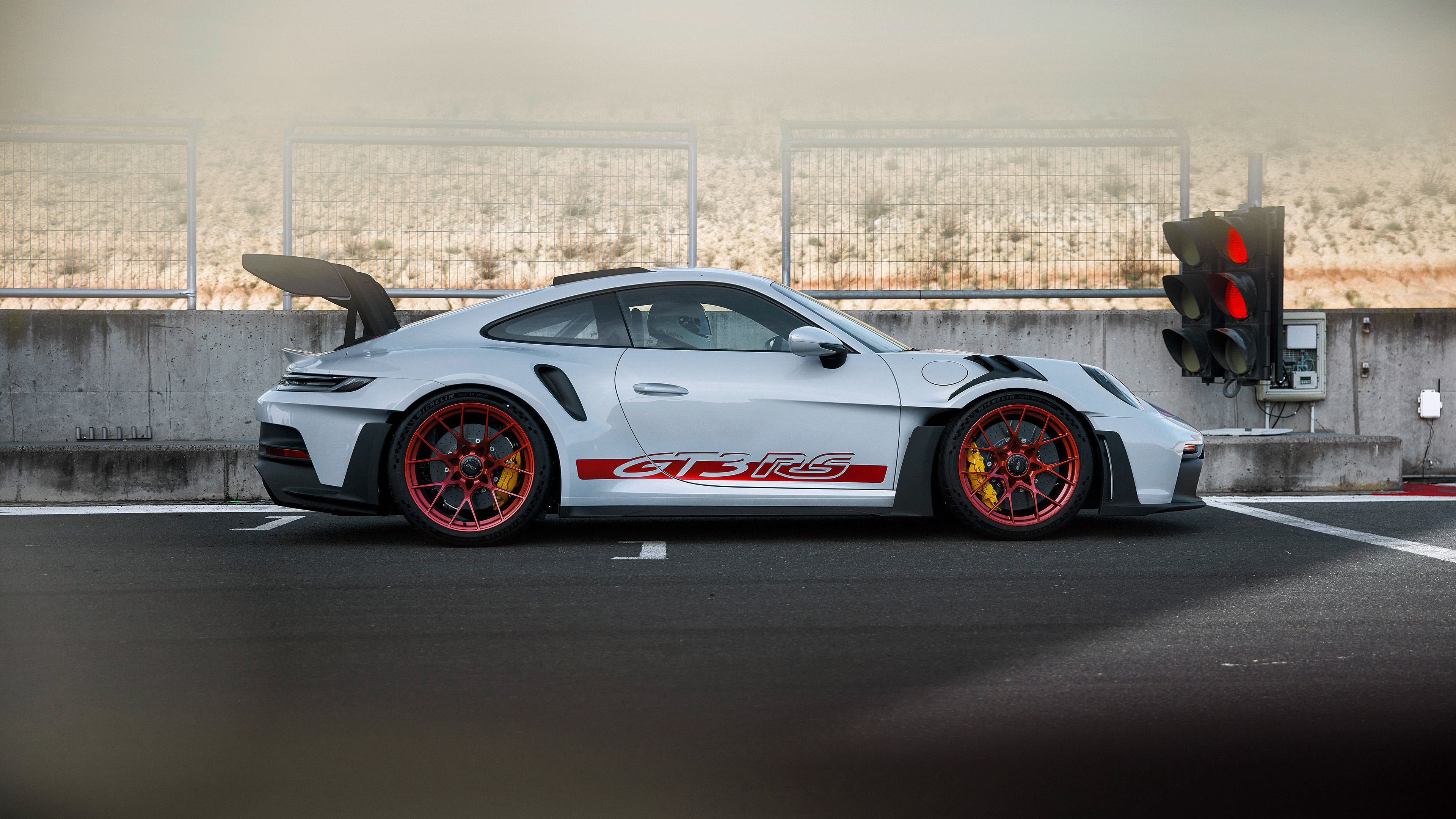 Red Porsche Taycan Side Profile